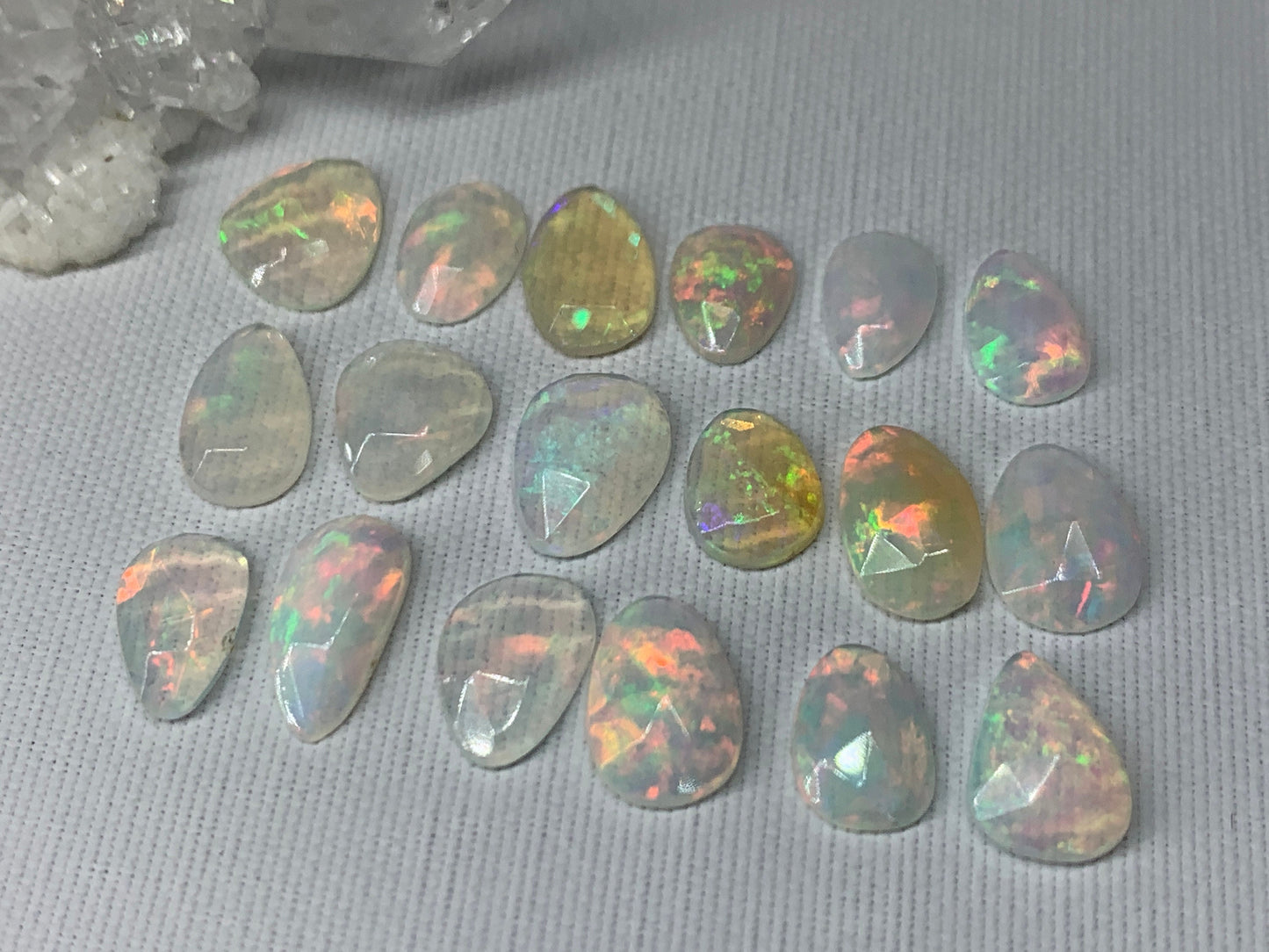 Faceted Ethiopian Opal 8-11mm long cabochon