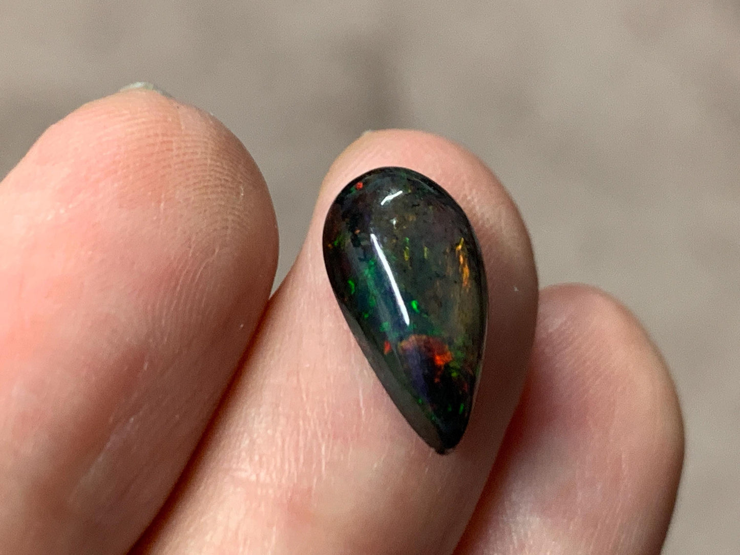 Black Ethiopian Opal pear 7x14x4mm cabochon