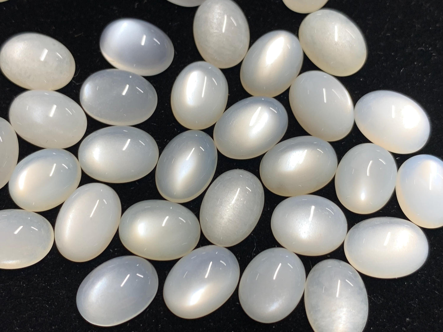 White Moonstone oval 8-11mm long cabochon