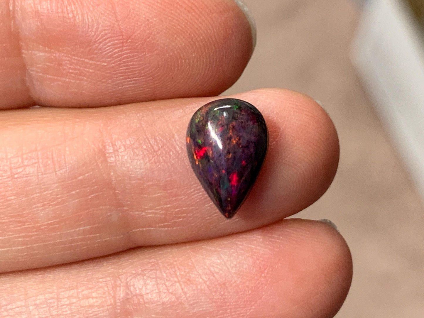 Black Ethiopian Opal pear 8x11x4mm cabochon