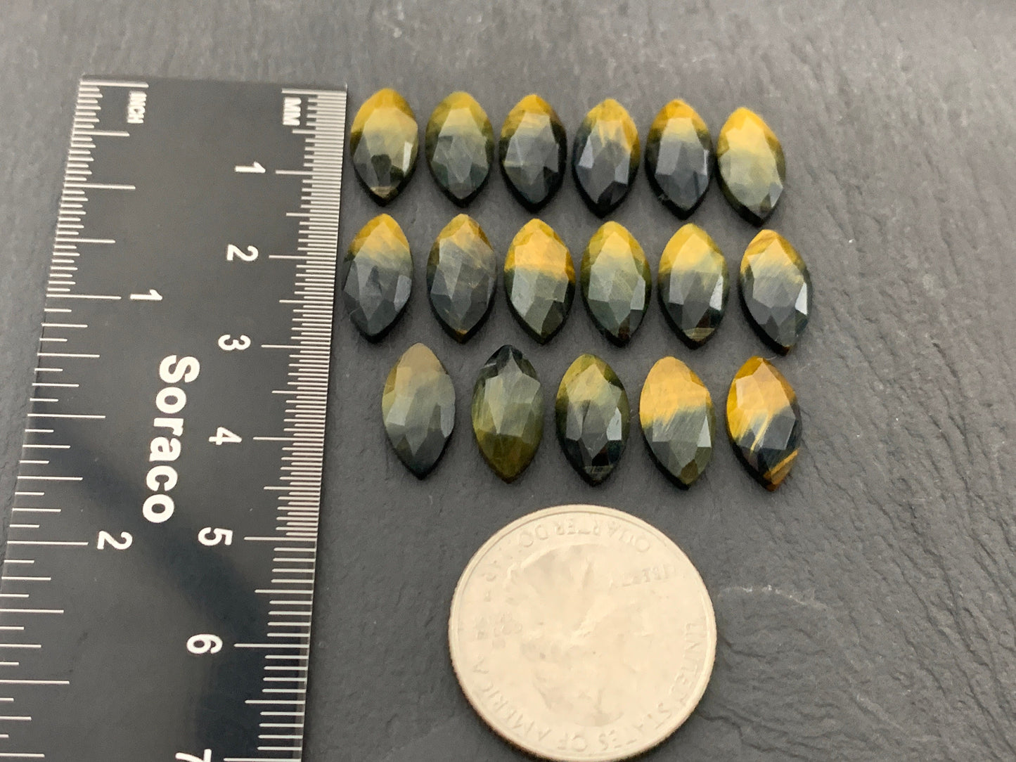 Faceted Yellow Tiger Eye marquise 7x14mm cabochon