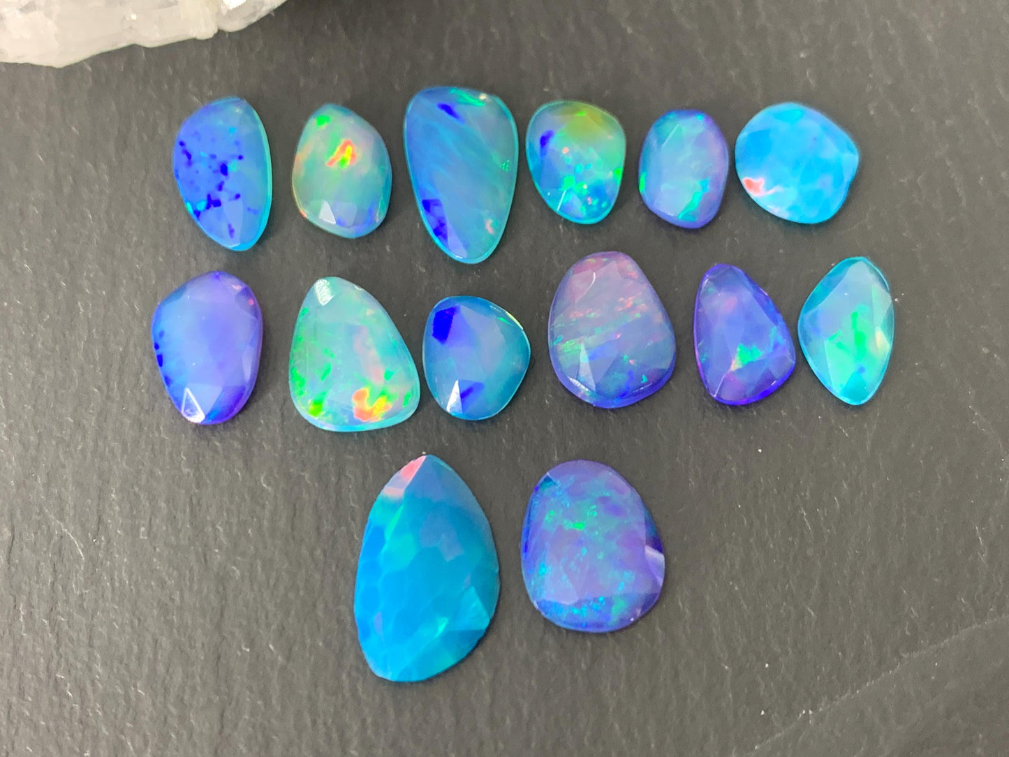 Faceted Blue Ethiopian Opal 8-14mm long cabochon