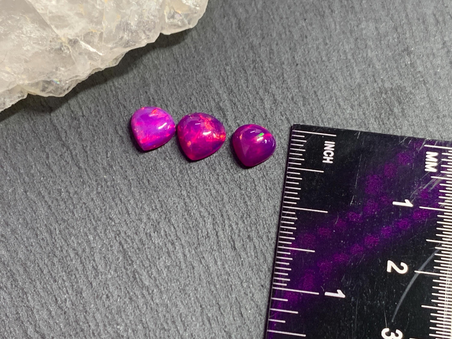 Ethiopian Opal pear 7-8mm long cabochon - Natural Opal smoked to purple color