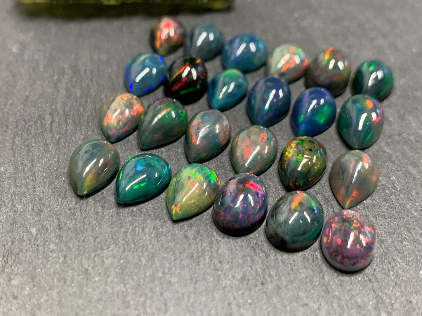 Black Ethiopian Opal pear 8-9mm long cabochon