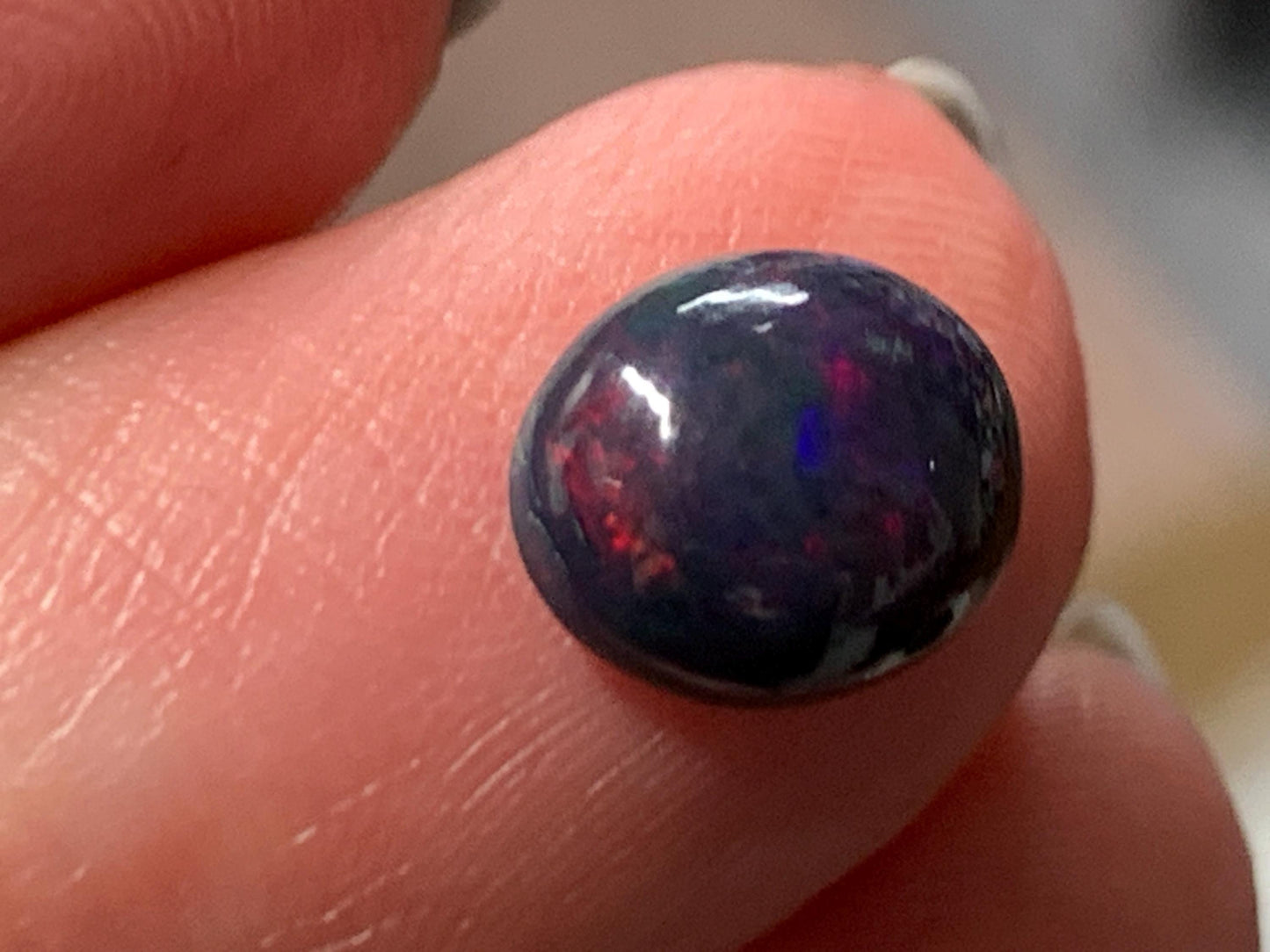Natural Ethiopian Black Opal 7x9x4mm cabochon