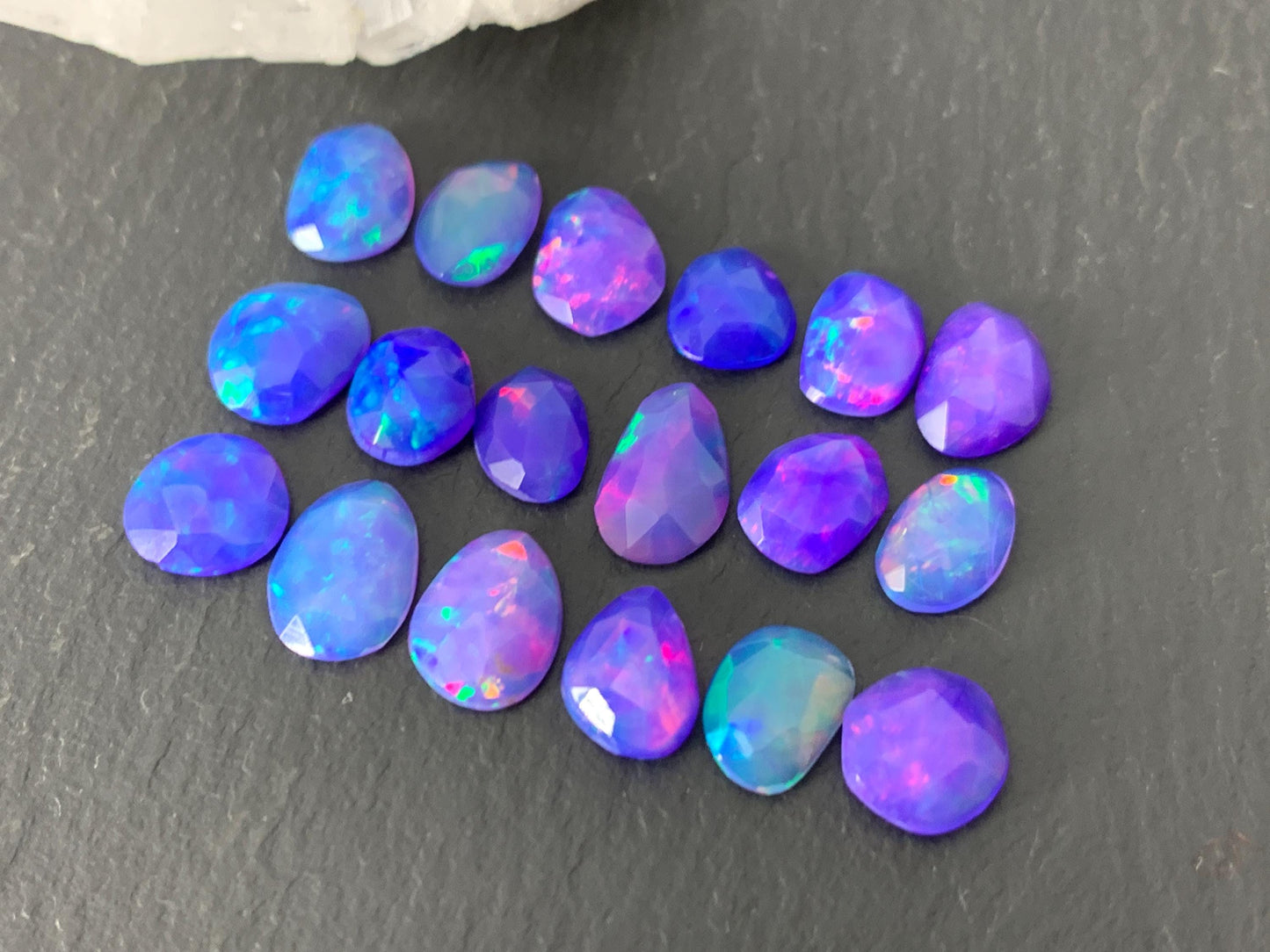 Faceted Purple Ethiopian Opal 7-8mm cabochon