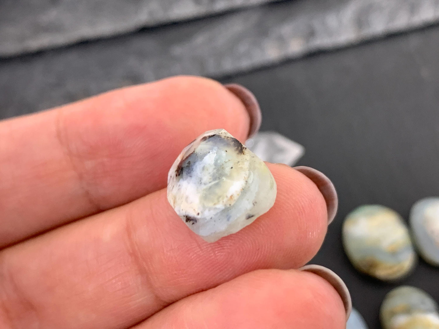 Faceted Peruvian Opal 8-14mm long cabochon.