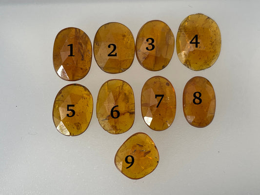 Faceted Orange Kyanite oval 9-12mm long cabochon