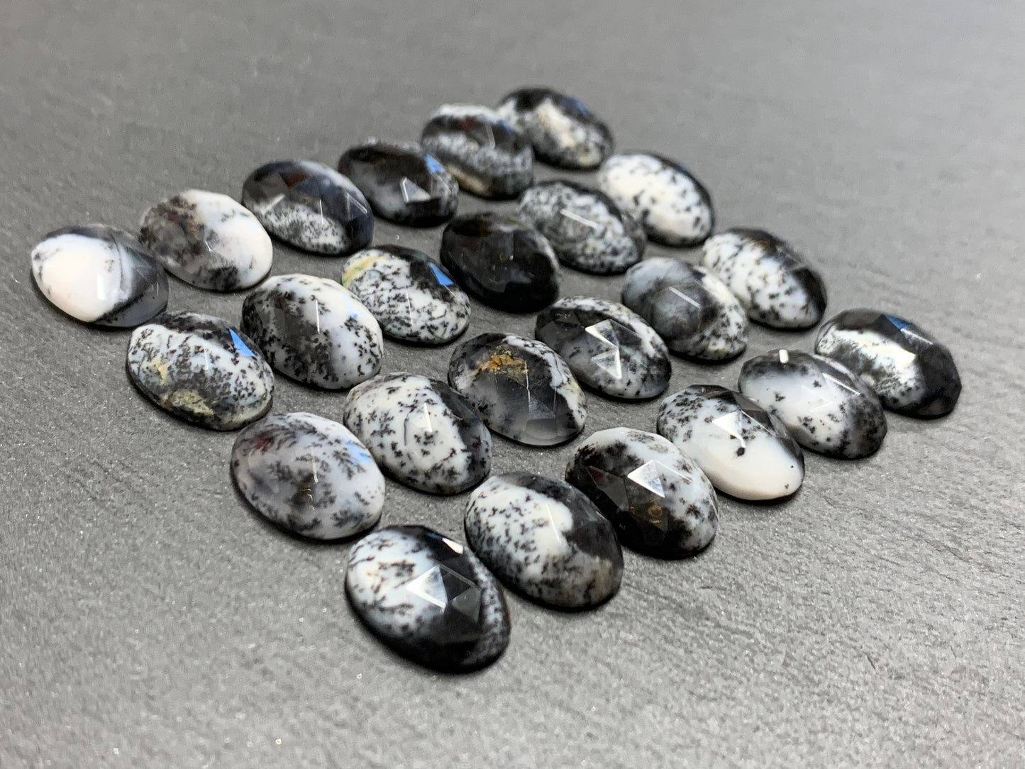 Faceted Dendrite Opal oval 10x14mm cabochon
