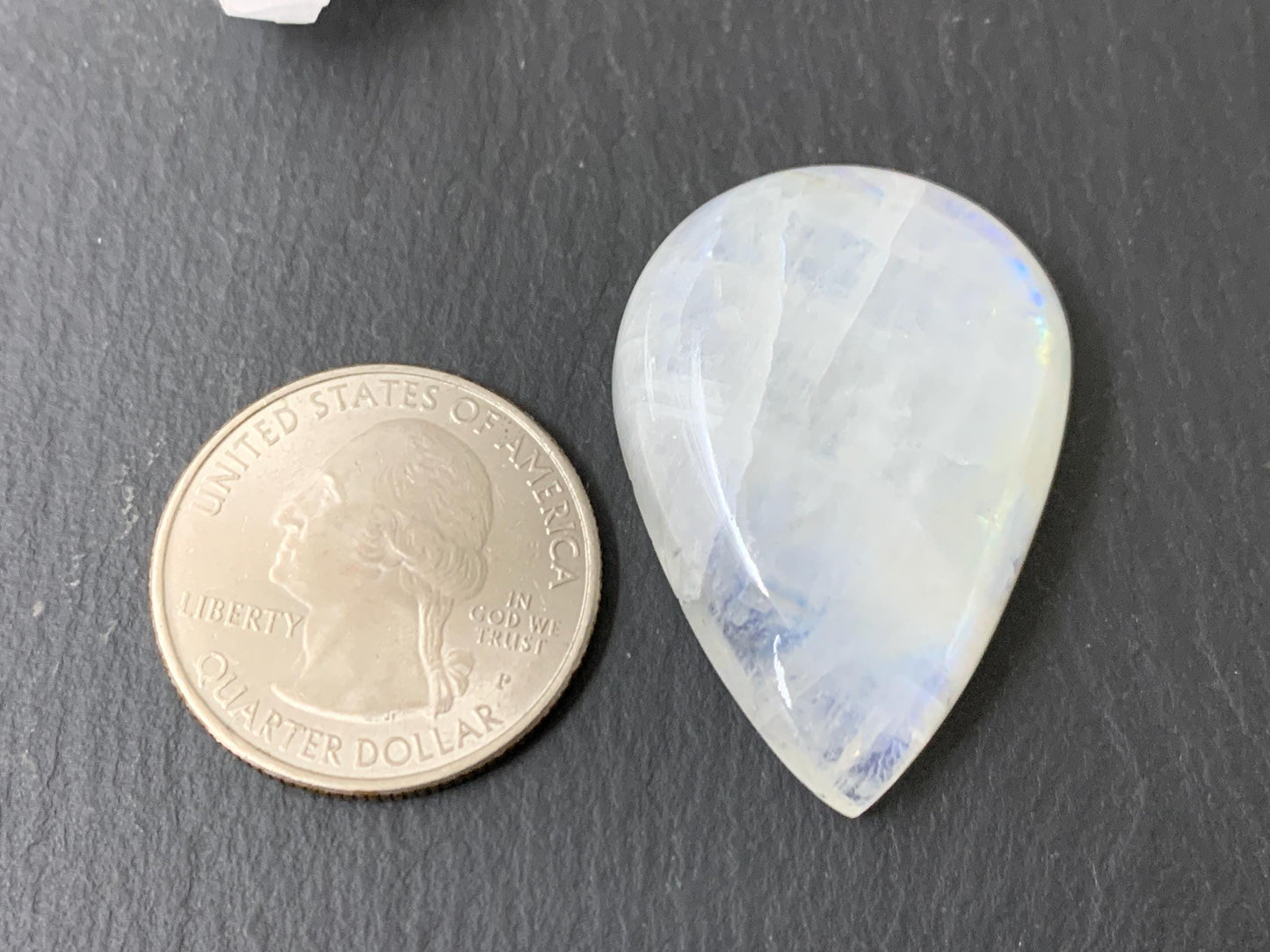 Rainbow Moonstone pear 36x26x9mm cabochon