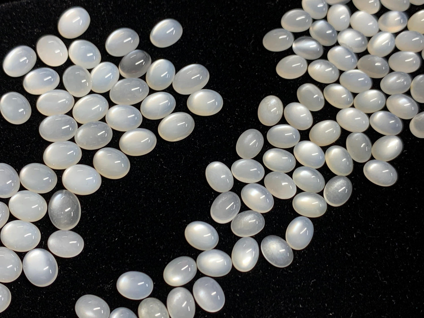 White Moonstone oval 8-11mm long cabochon