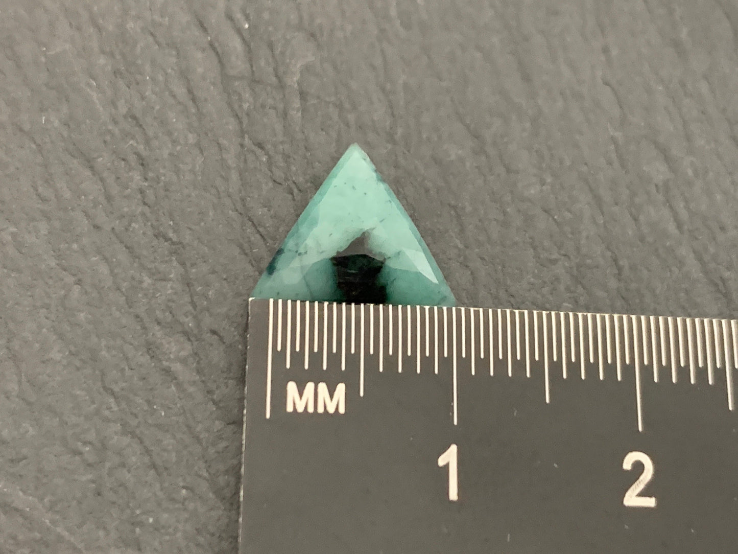 Faceted Emerald triangle 10mm cabochon