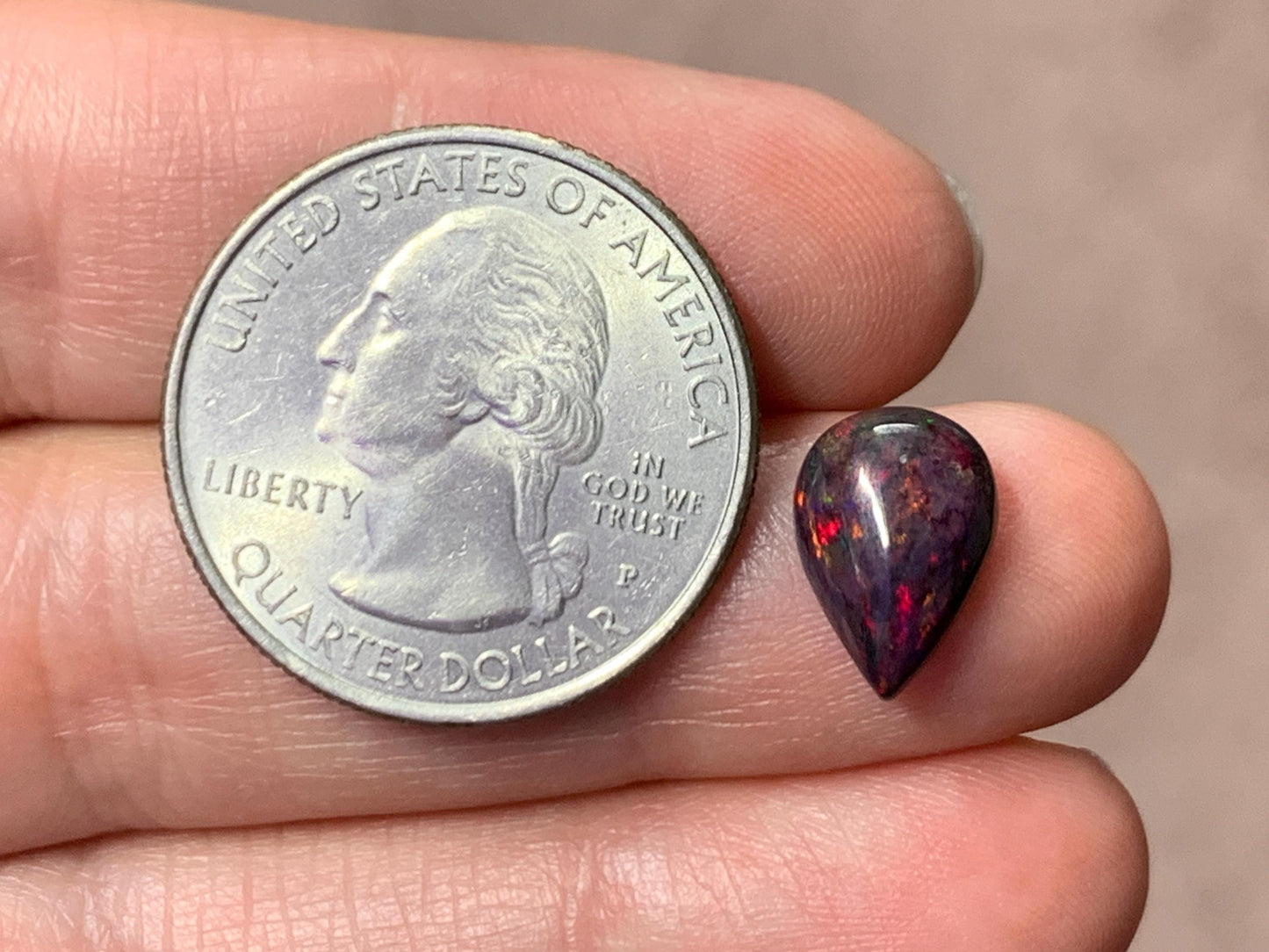 Black Ethiopian Opal pear 8x11x4mm cabochon
