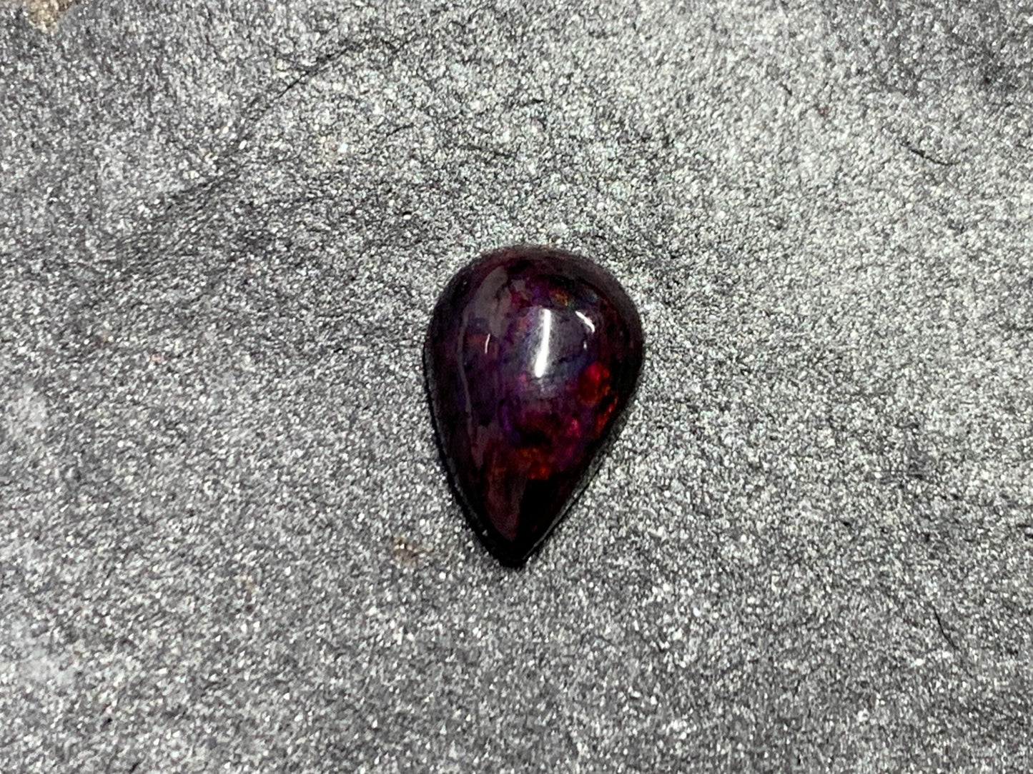 Black Ethiopian Opal pear 9x12x5mm cabochon
