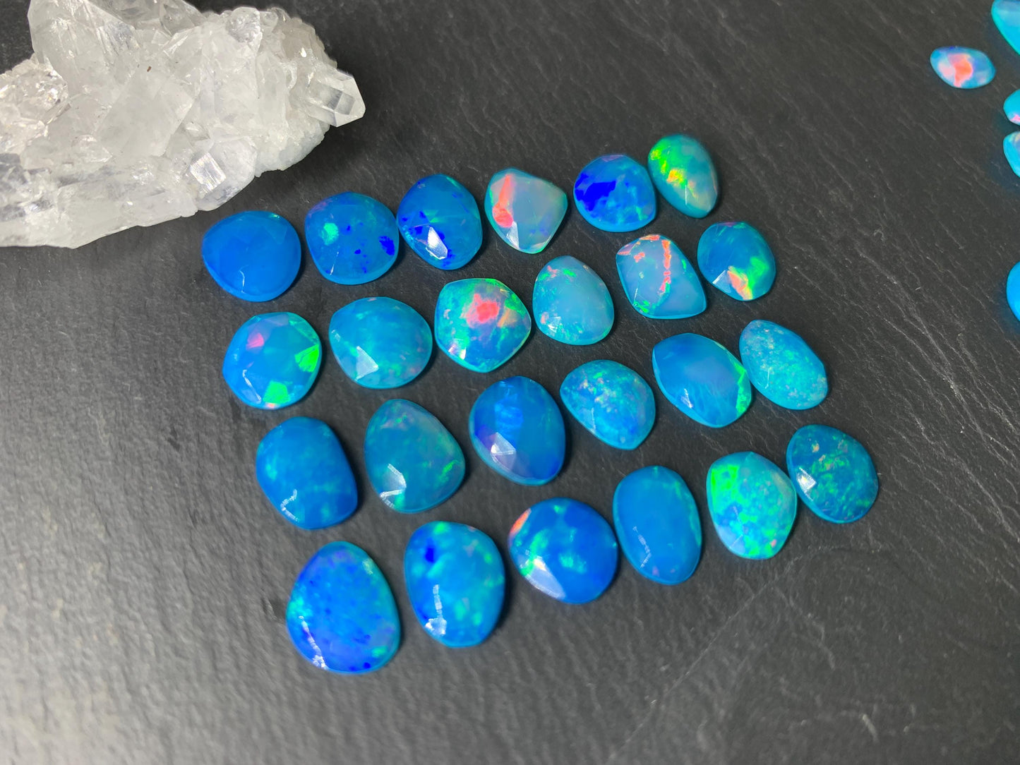 Faceted Blue Ethiopian Opal 8-10mm long cabochon