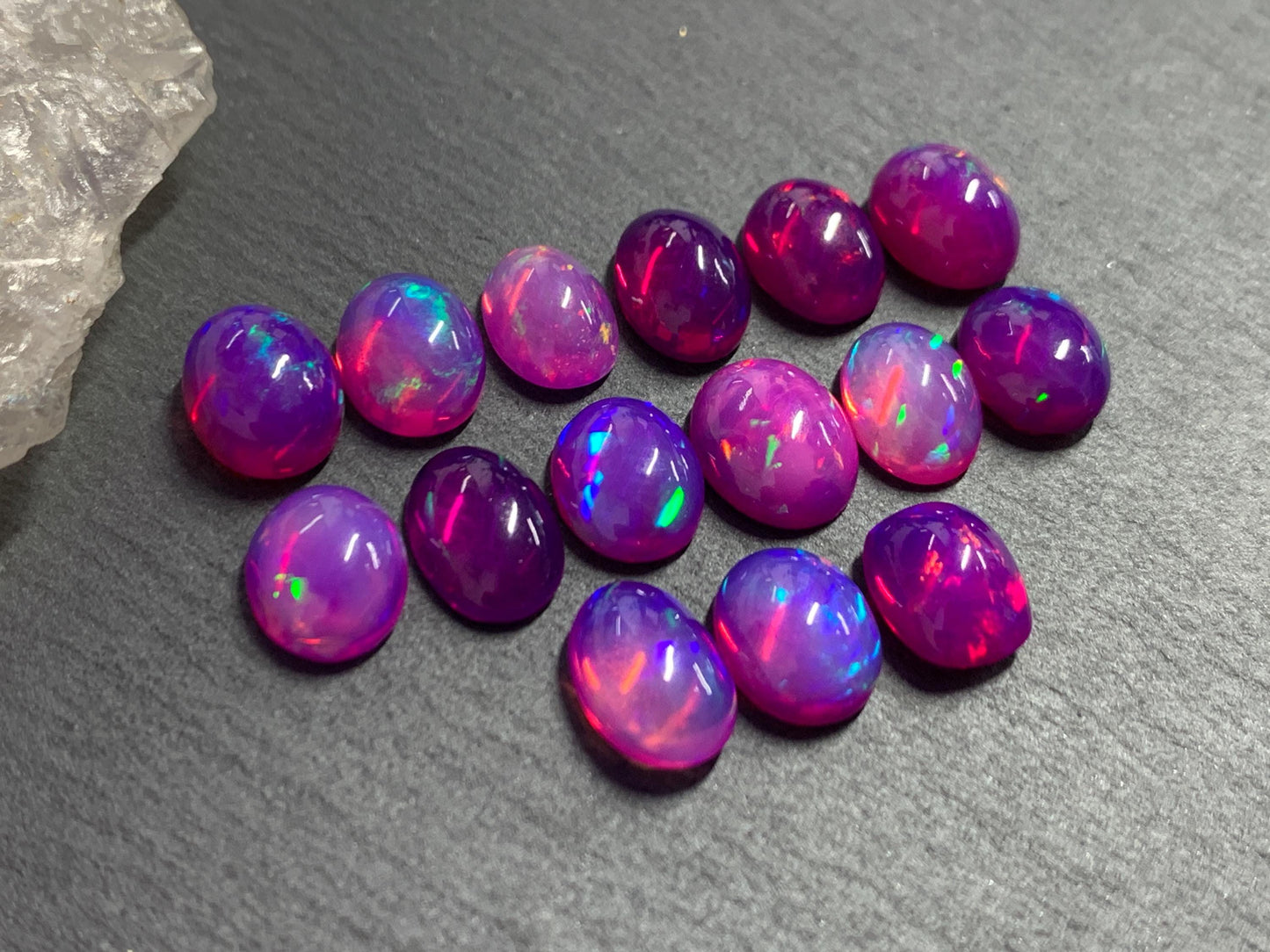 Ethiopian Opal oval 8x10mm cabochon - Natural Opal smoked to purple color