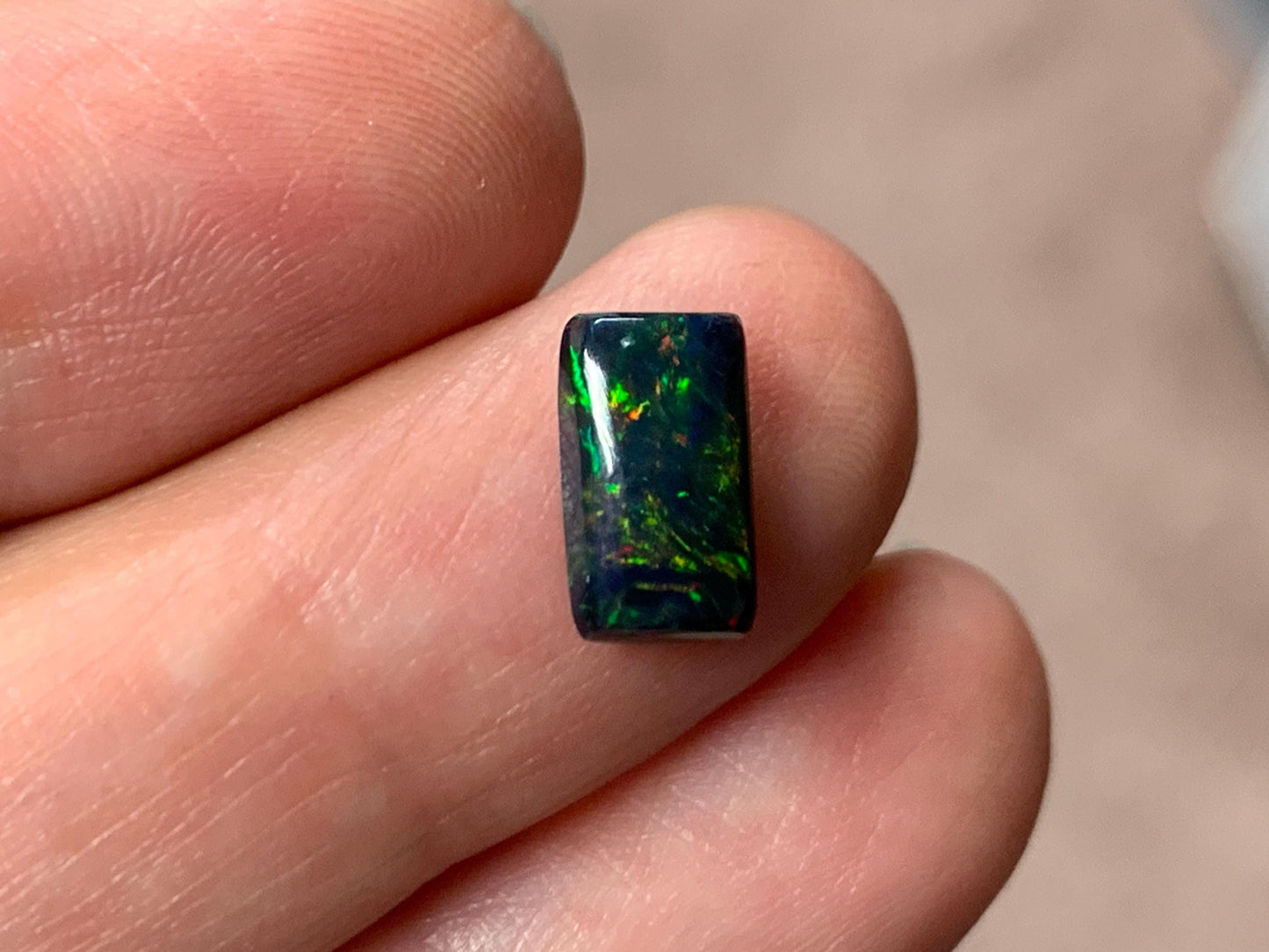 Black Ethiopian Opal rectangle 6x10x3mm cabochon