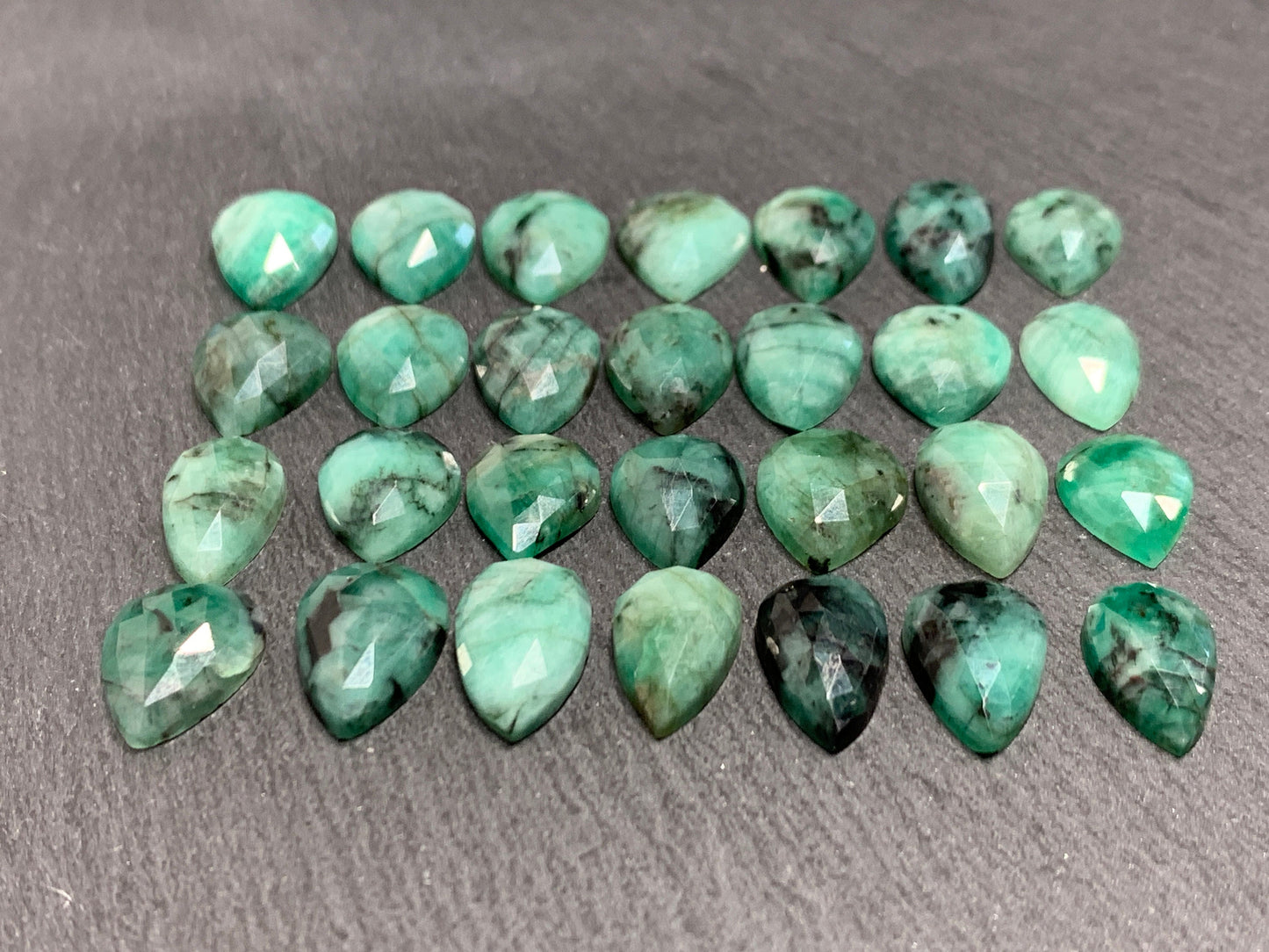 Emerald Faceted pear 12-14mm cabochon