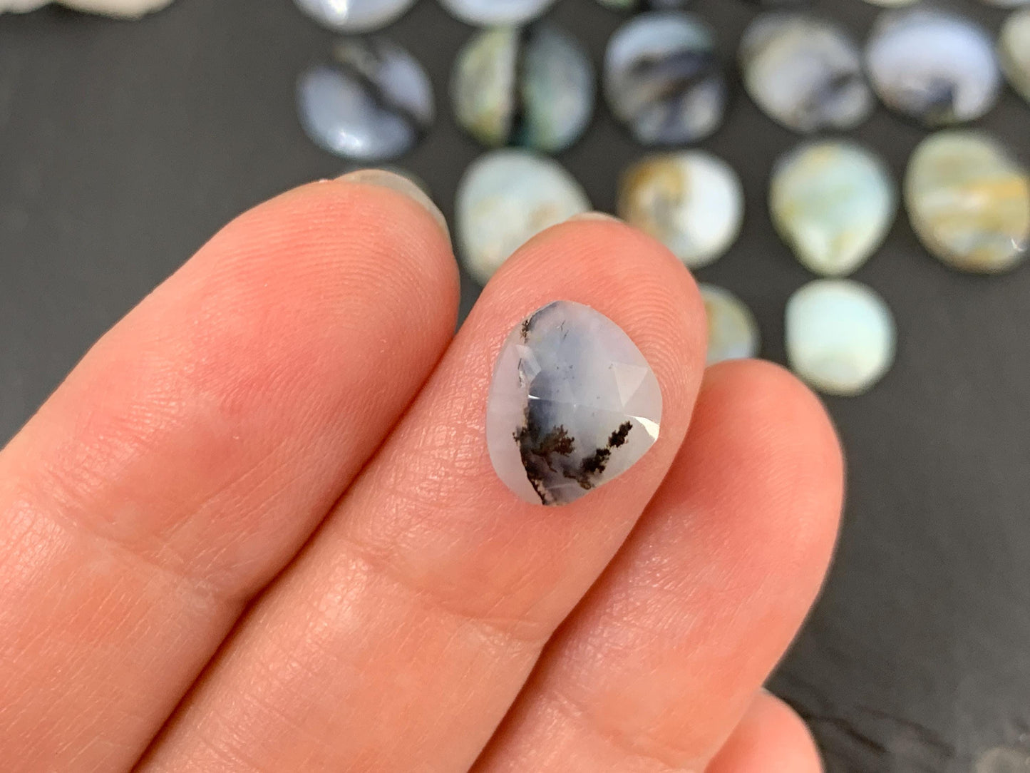 Faceted Peruvian Opal oval, pear 10-17mm long cabochon