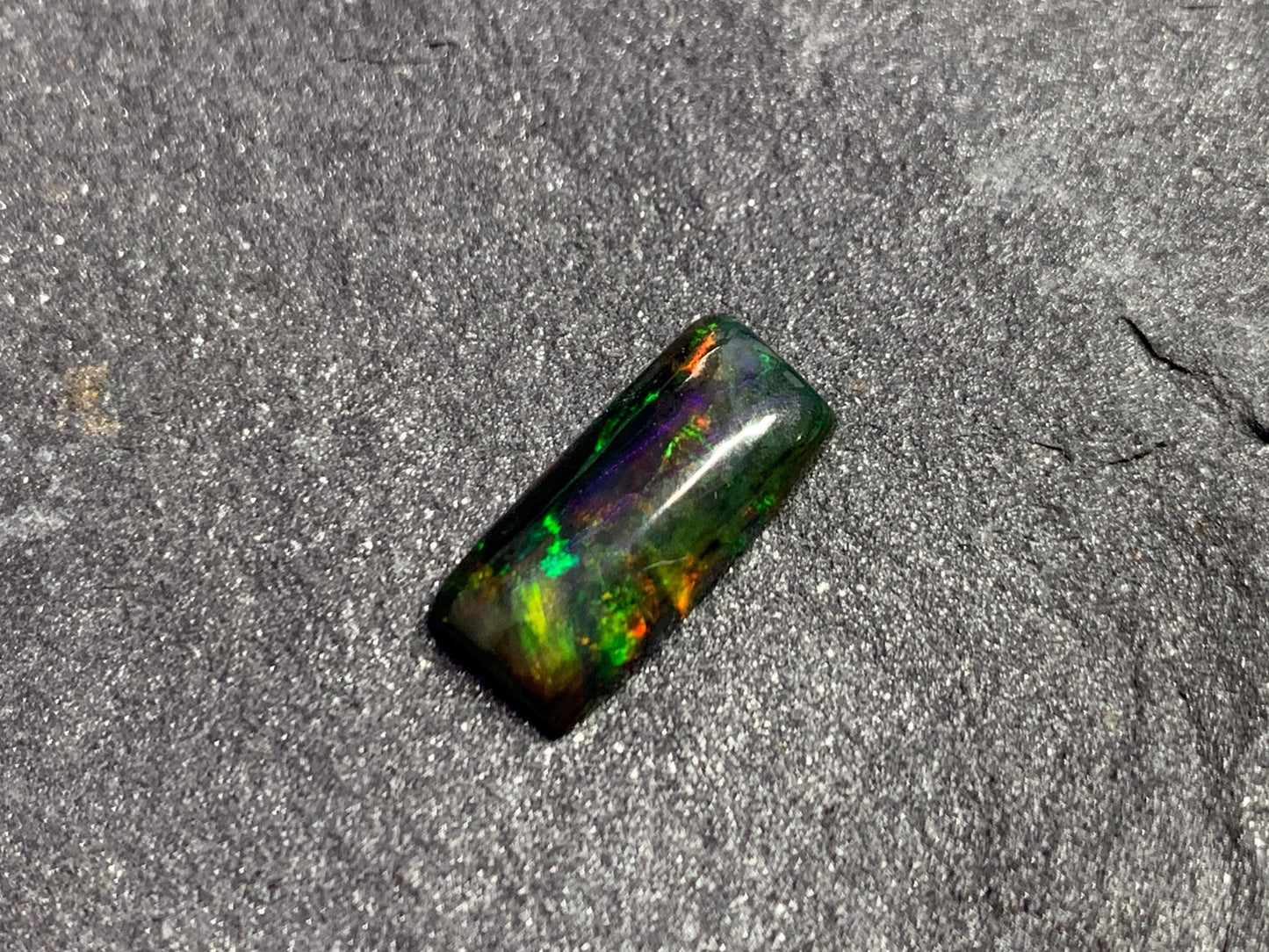 Black Ethiopian Opal rectangle 6x13x3mm cabochon