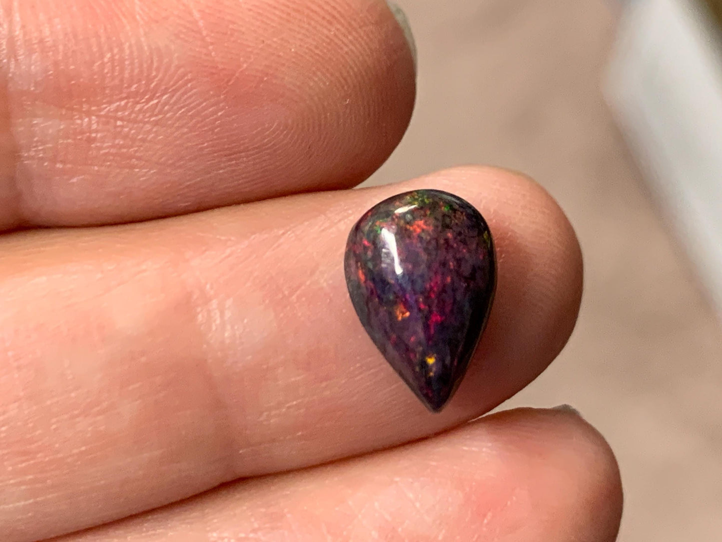 Black Ethiopian Opal pear 8x11x4mm cabochon