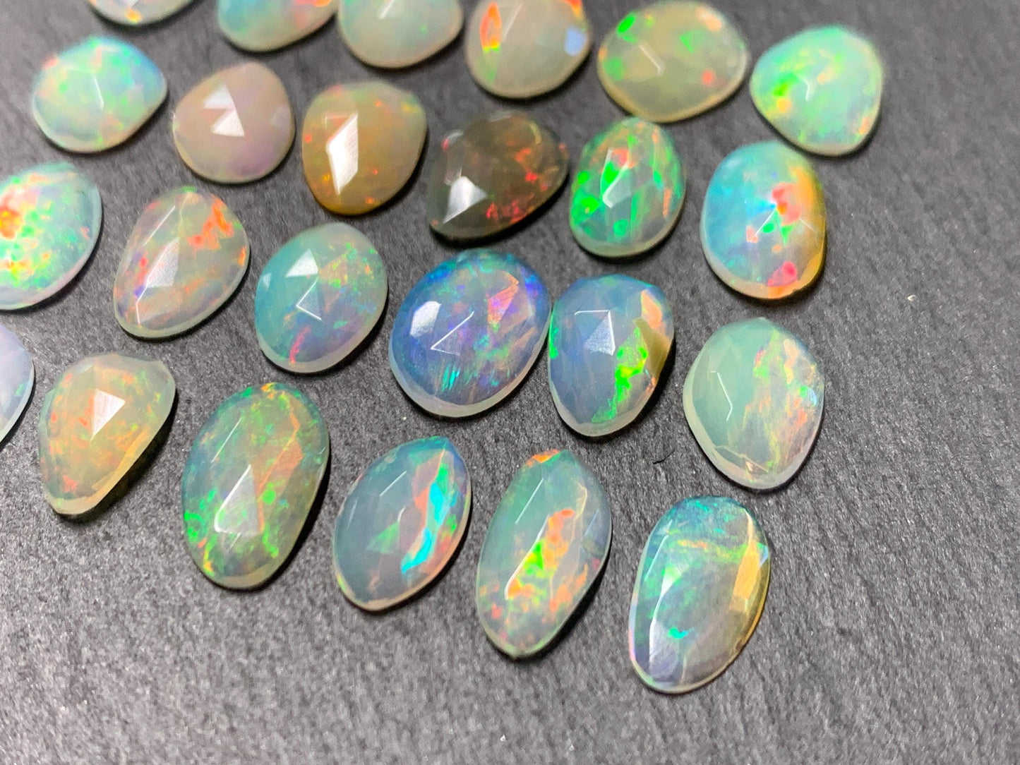 Faceted Ethiopian Opal 9-10mm long cabochon