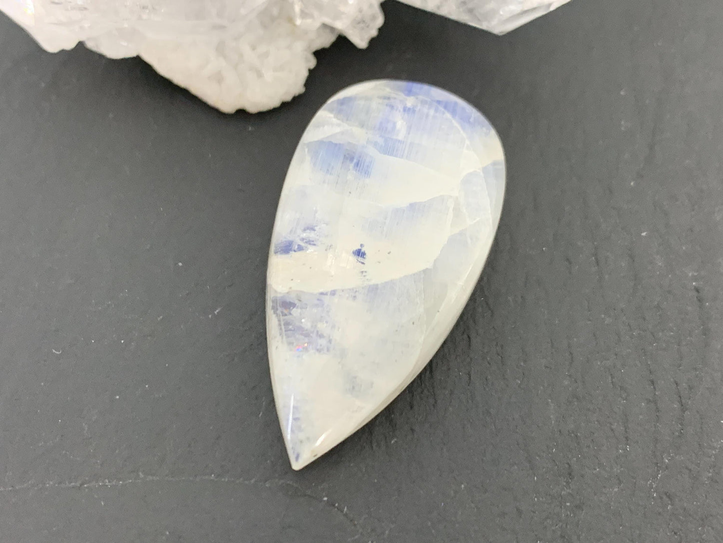Rainbow Moonstone 30x16x8mm cabochon