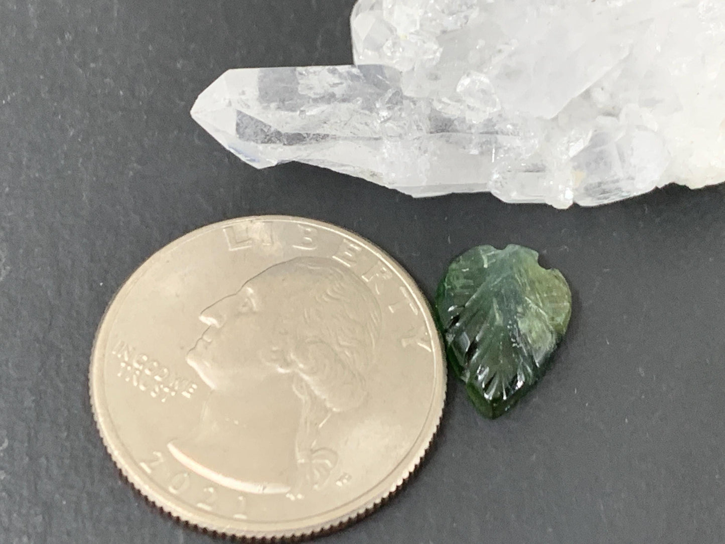 Carved Tourmaline 9x13x3mm cabochon