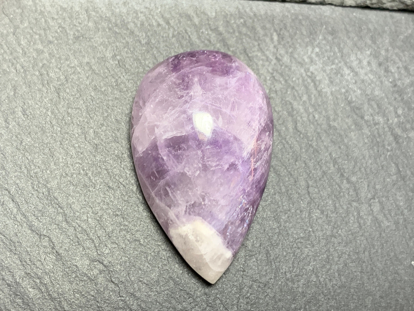Amethyst pear cabochon 35x22x12mm - free form hand cut in Africa