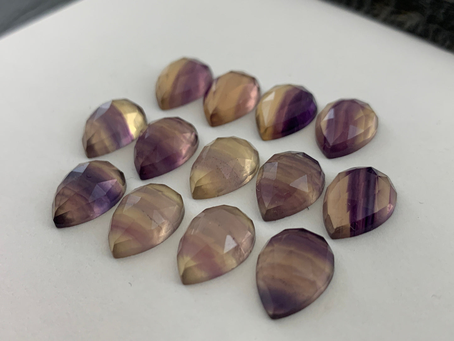 Faceted Fluorite pear 10x13mm cabochon