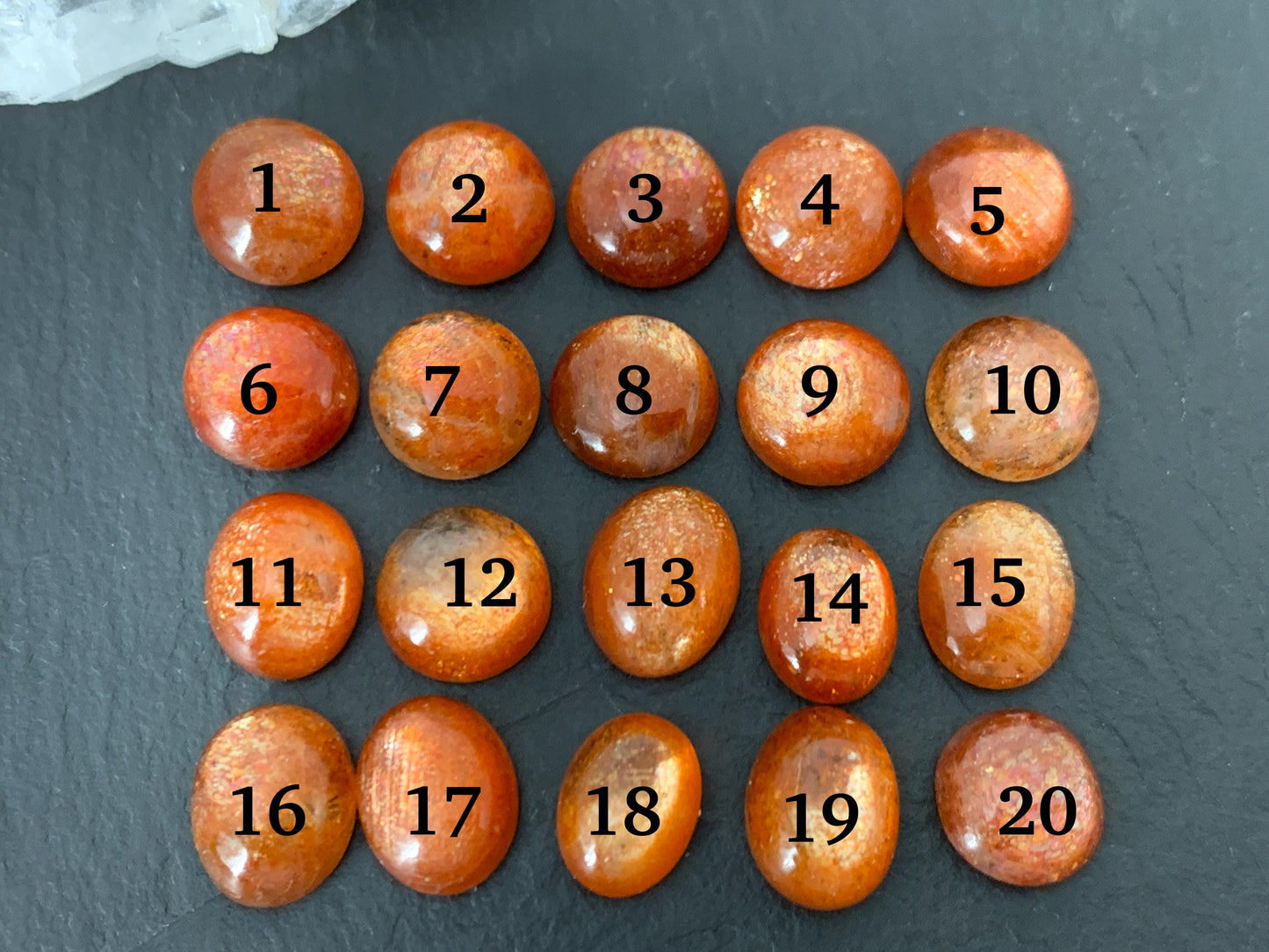 Sunstone round, oval 9-10mm long cabochon