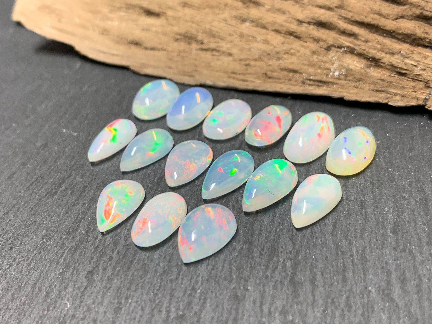 Ethiopian Opal 12-14mm long cabochon - pear, oval