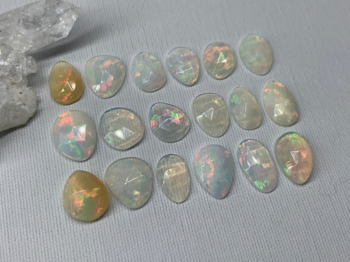 Faceted Ethiopian Opal 10-12mm long cabochon