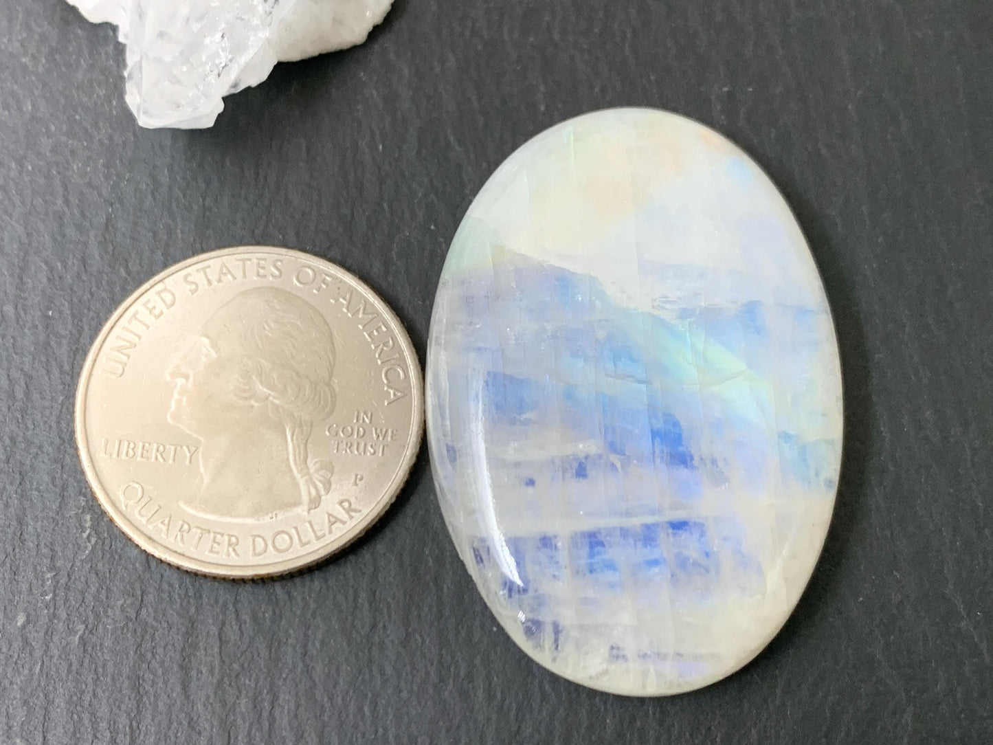 Rainbow Moonstone oval 41x29x8mm cabochon