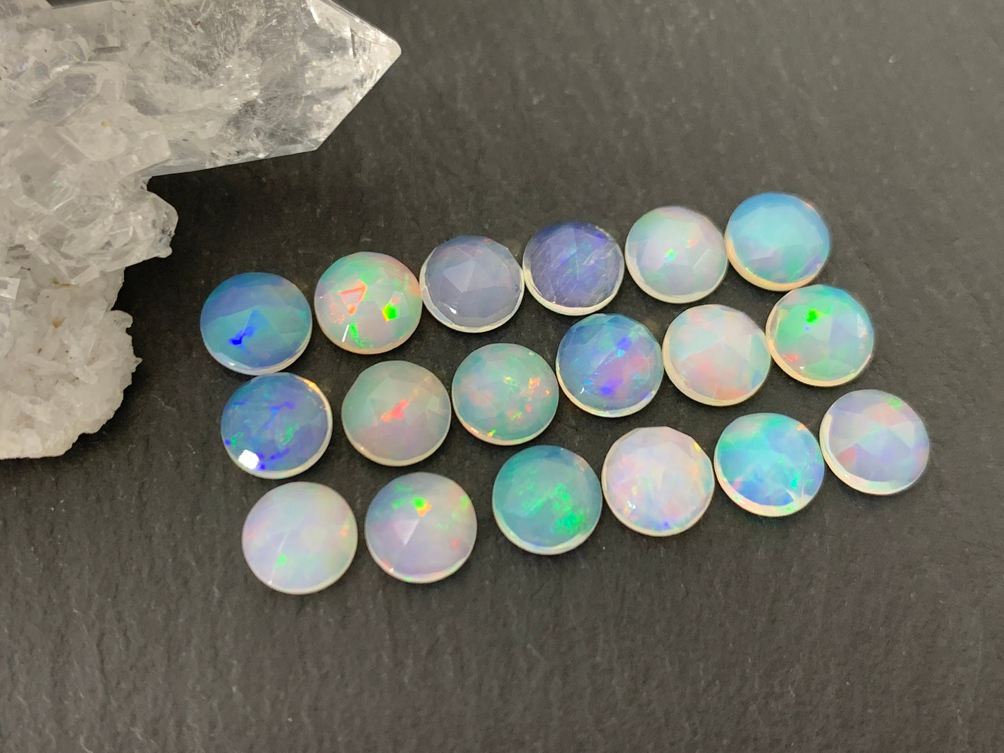 Faceted Ethiopian Opal round 6mm cabochon