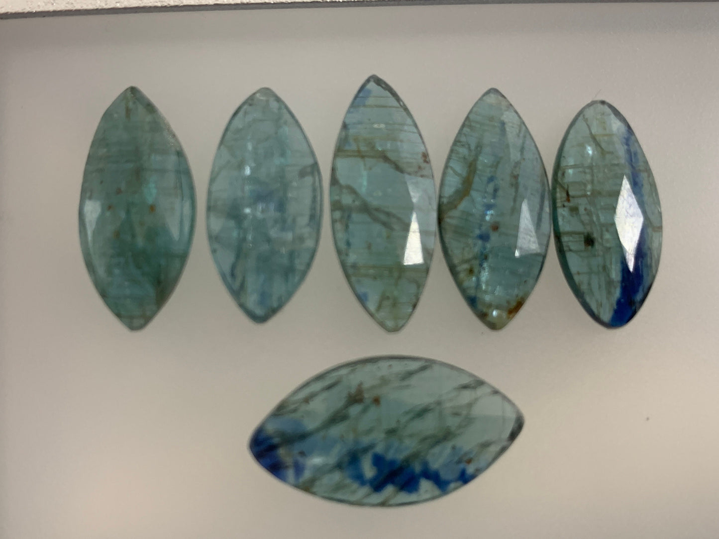 Faceted Emerald Green Kyanite marquise 21-22mm long cabochon