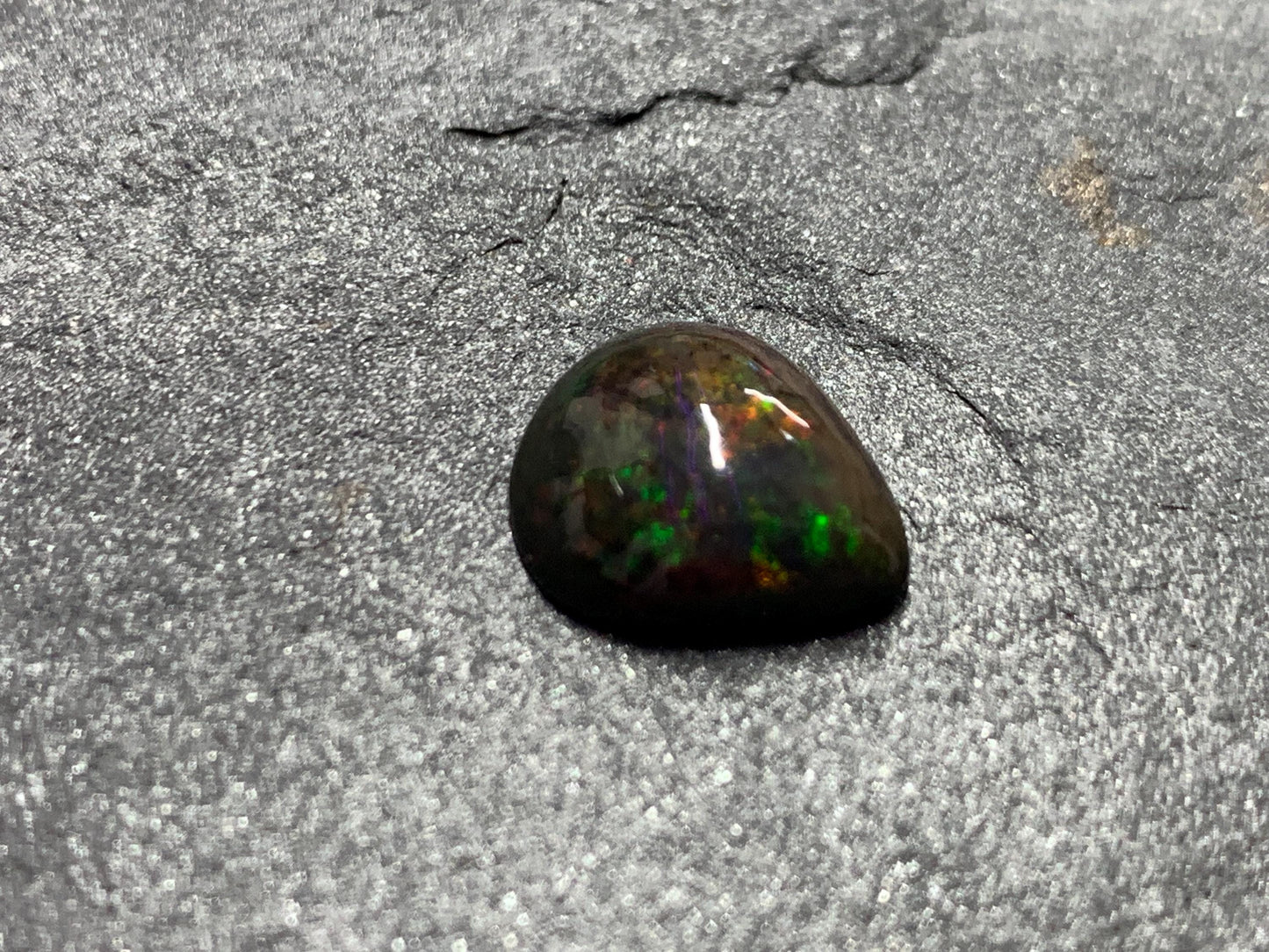 Black Ethiopian Opal pear 10x12x4mm cabochon