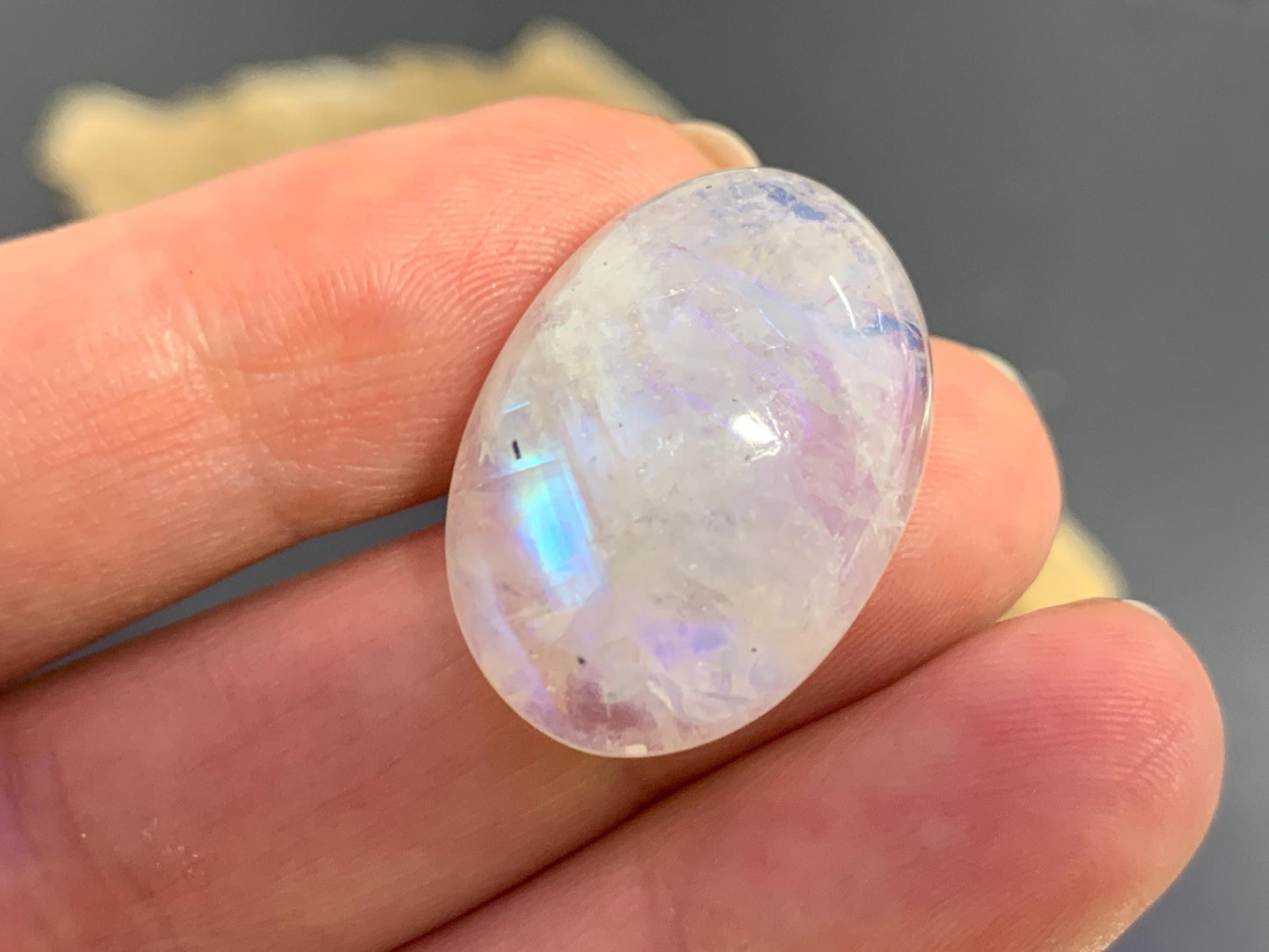 Rainbow Moonstone oval 24x18x9mm cabochon
