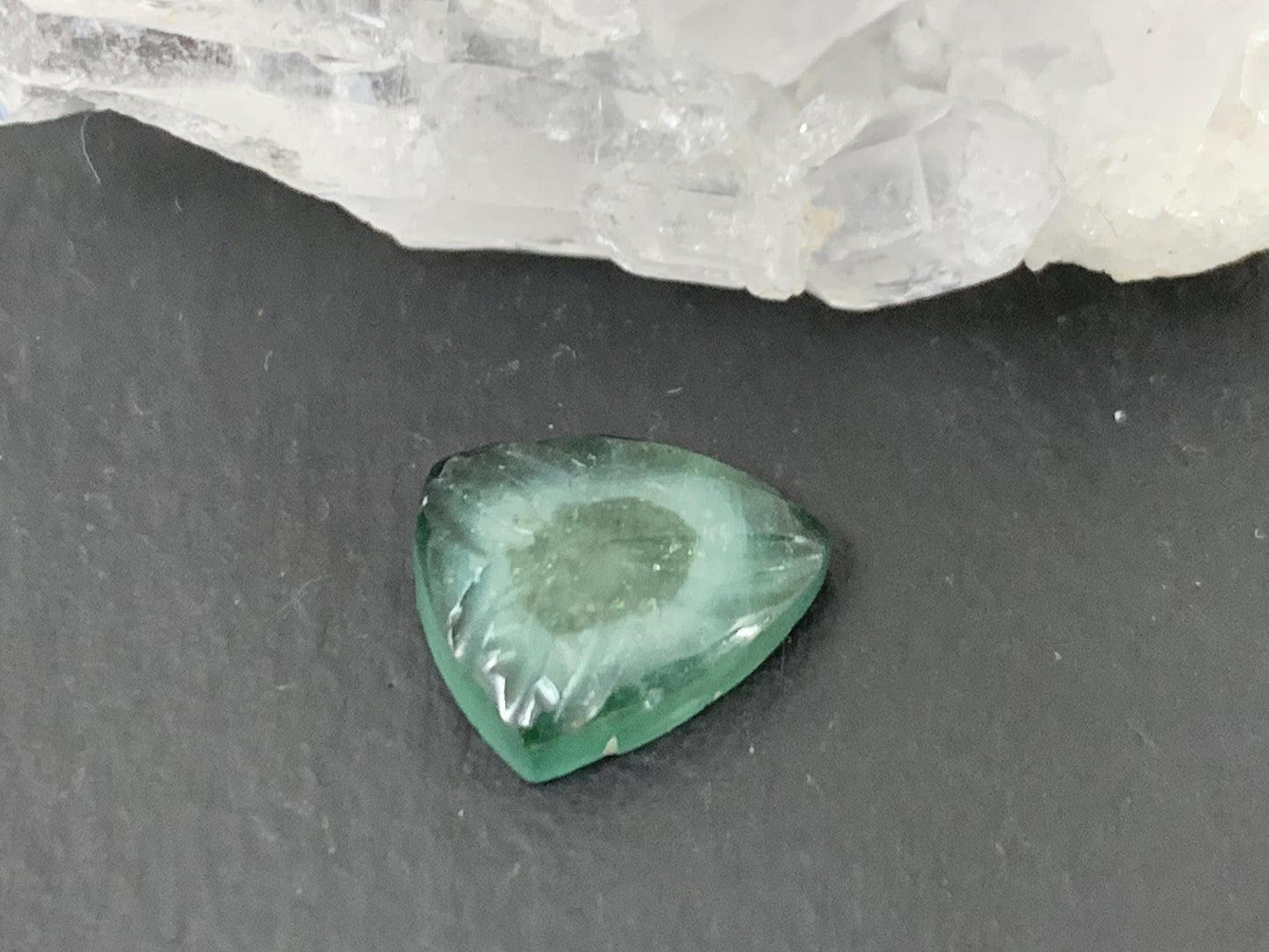 Carved Tourmaline 10x11x3mm cabochon