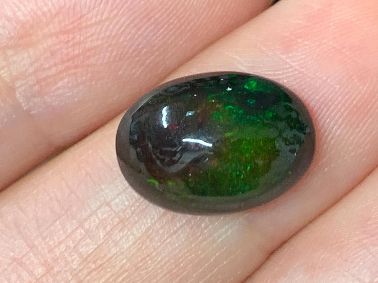 Natural Ethiopian Black Opal 10x14x6mm cabochon