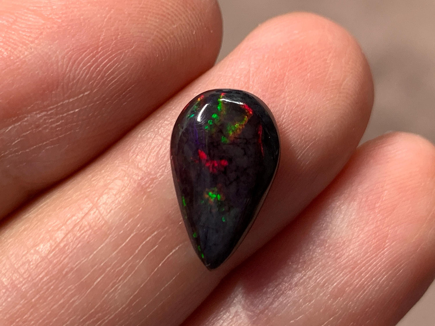 Black Ethiopian Opal pear 9x14x3mm cabochon