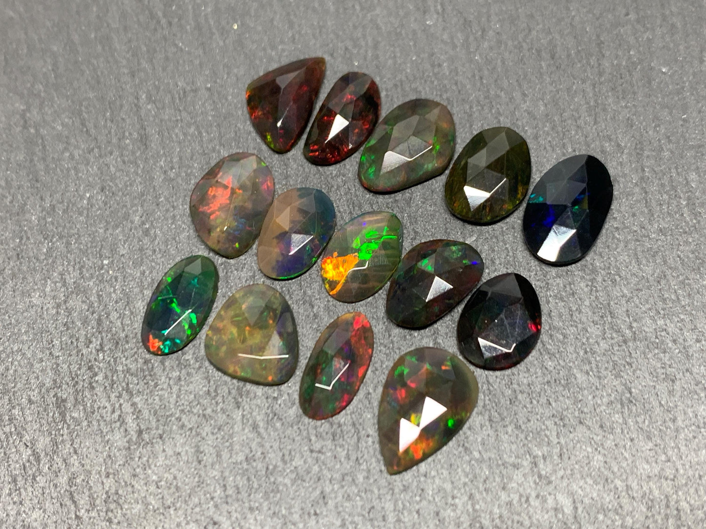 Faceted Black Ethiopian Opal 9-12mm long cabochon