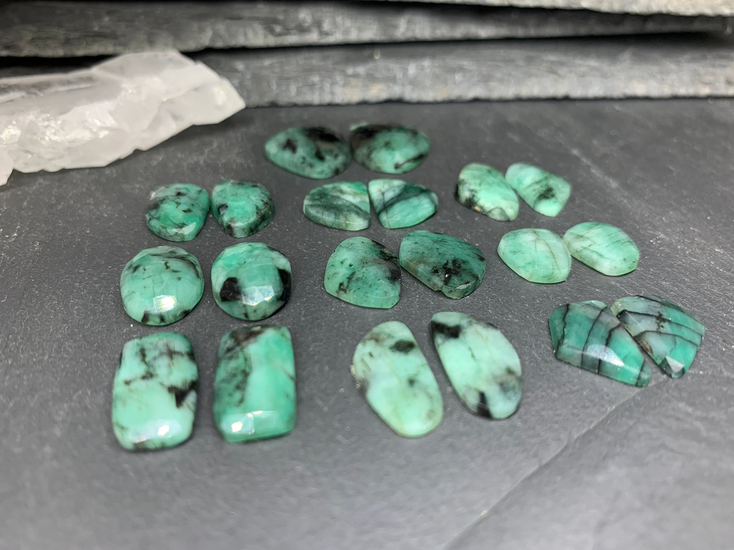 Faceted Emerald Pair 13-17mm long cabochon