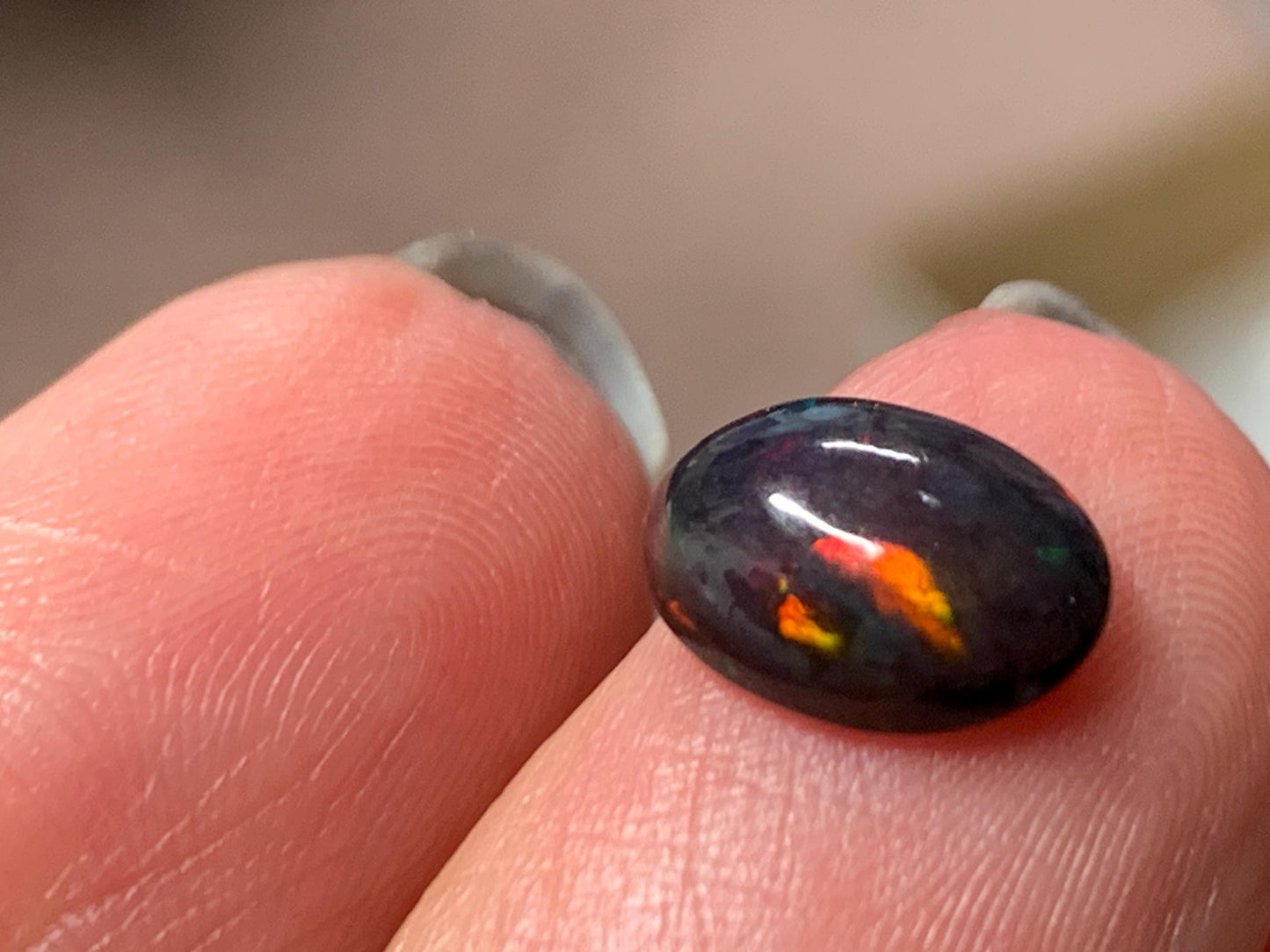 Natural Ethiopian Black Opal 7x9x3mm cabochon