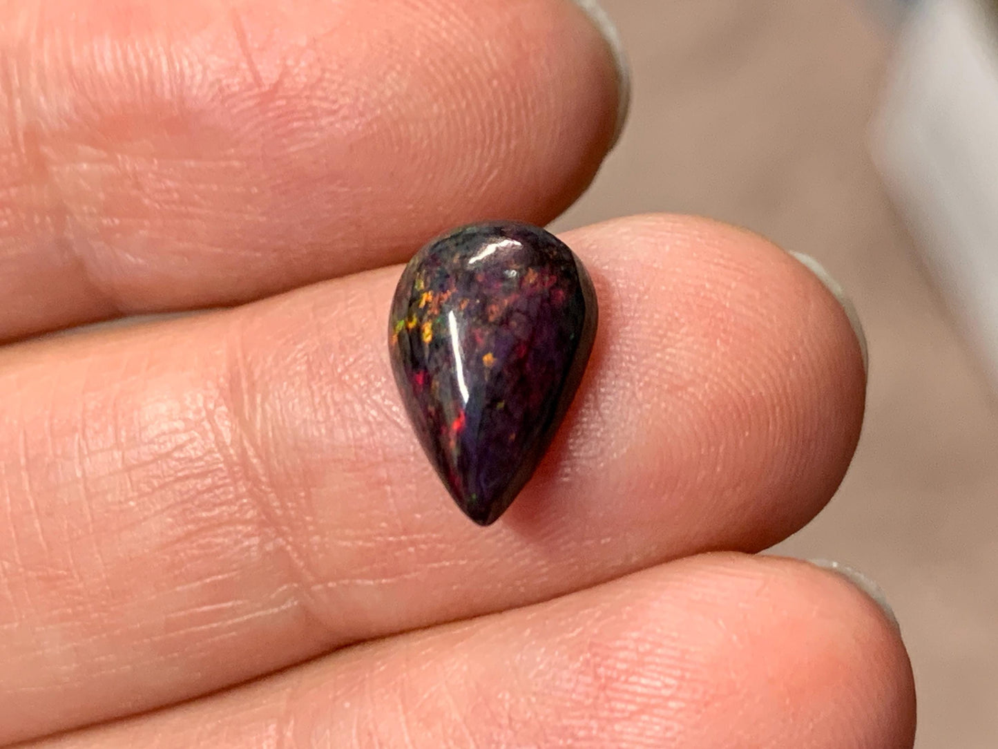 Black Ethiopian Opal pear 8x11x4mm cabochon