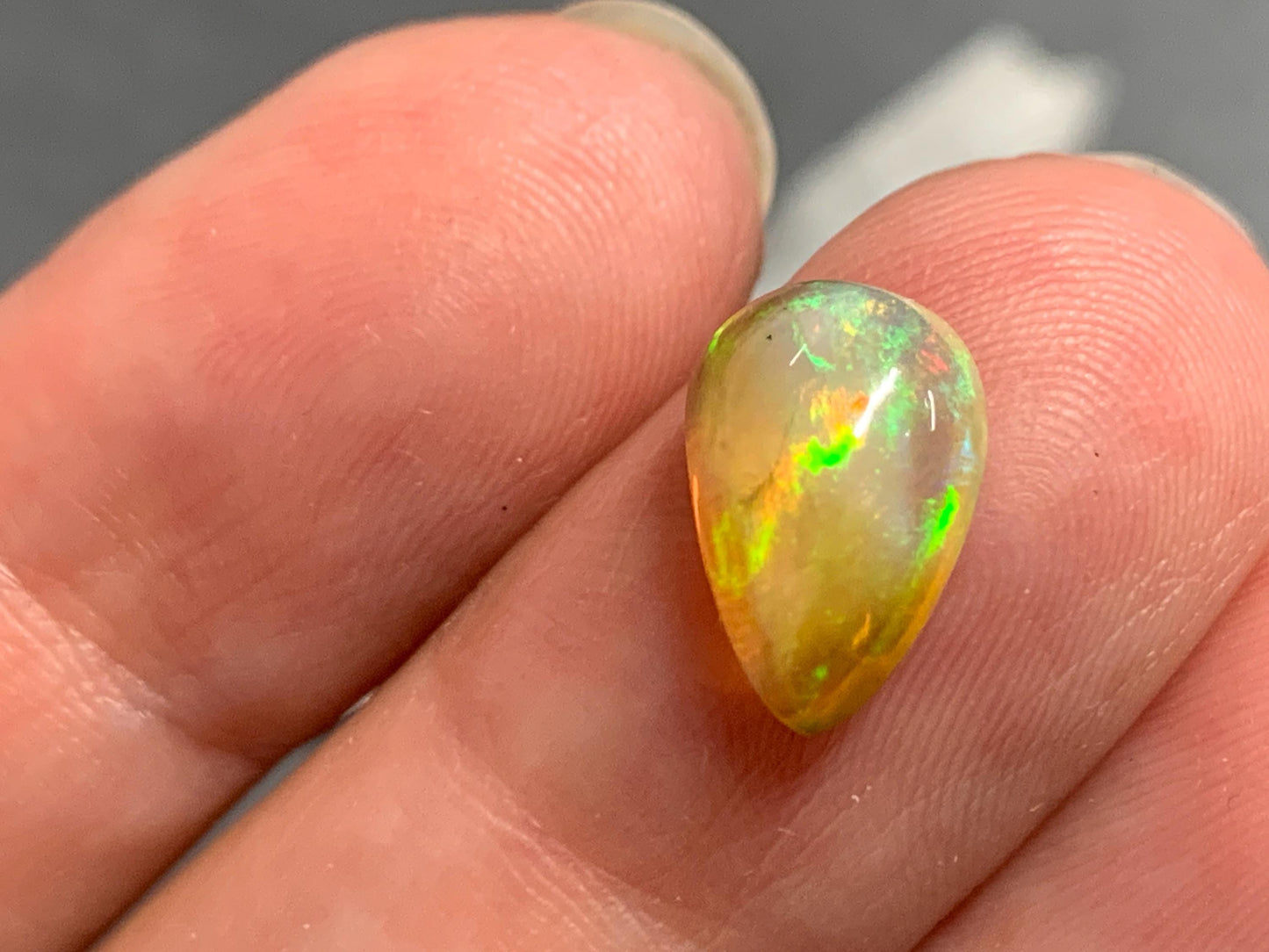 Natural Black Ethiopian Opal pear 8x11x5mm cabochon