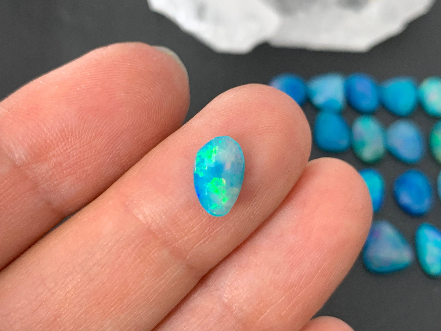 Faceted Blue Ethiopian Opal 9-10mm long cabochon