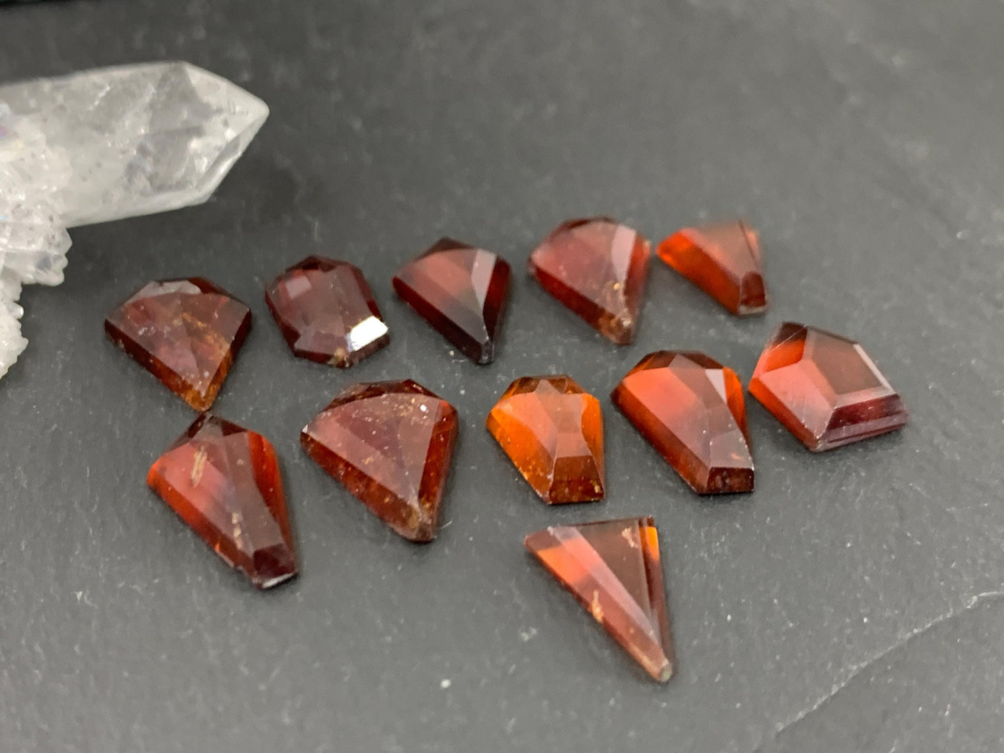 Faceted Hessonite Garnet 9-12mm long cabochon.