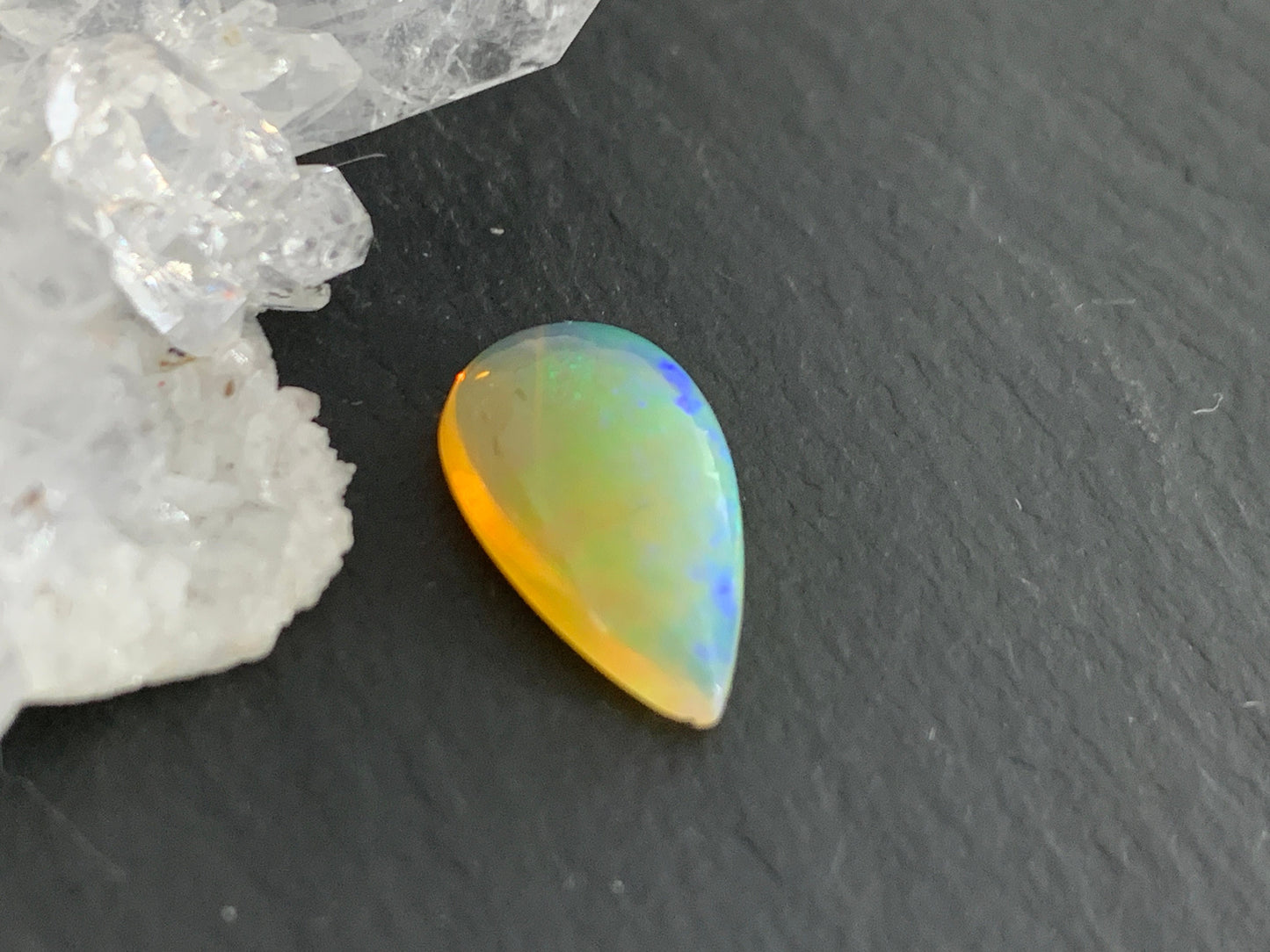 Ethiopian Opal 8x14x4mm cabochon