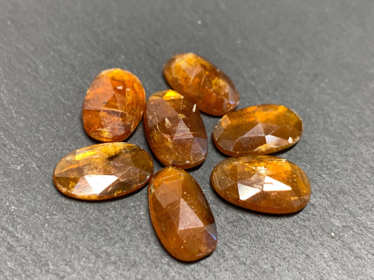 Damaged - faceted orange Kyanite oval 13mm long cabochons